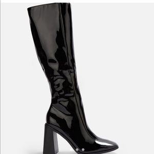 knee high heeled black pvc boots